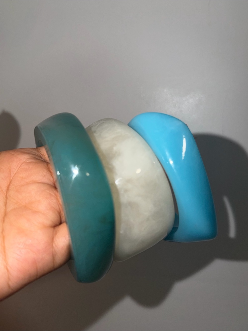Set of Three Decorative Resin Bangles in Teal, Cream, and Sky Blue